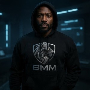 confident Black man in a high-tech modern command center, wearing a premium black streetwear hoodie. 2