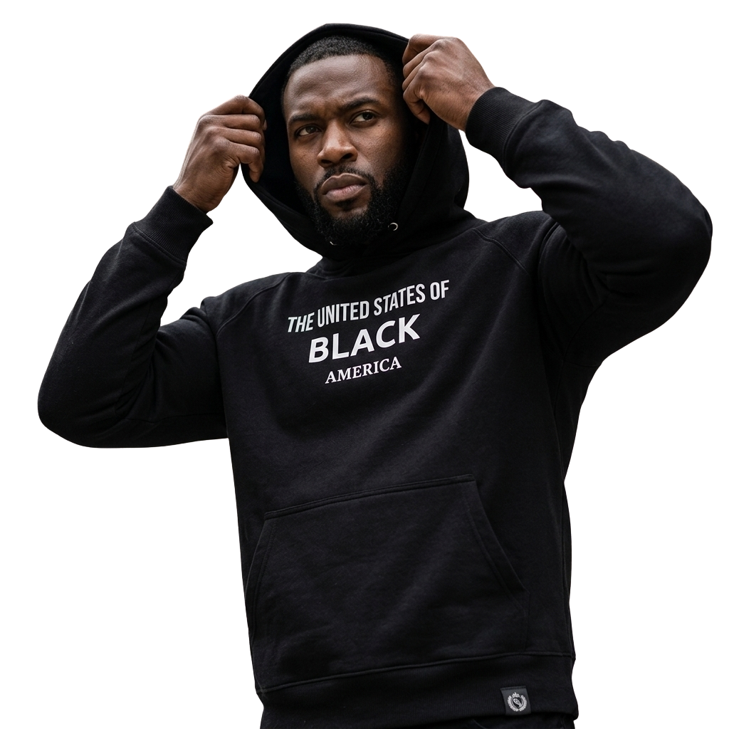 Black Empire Rising Hoodie with white "THE UNITED STATES OF BLACK AMERICA" text, worn by powerful Black man pulling hood up, premium unisex fit, sovereignty armor apparel